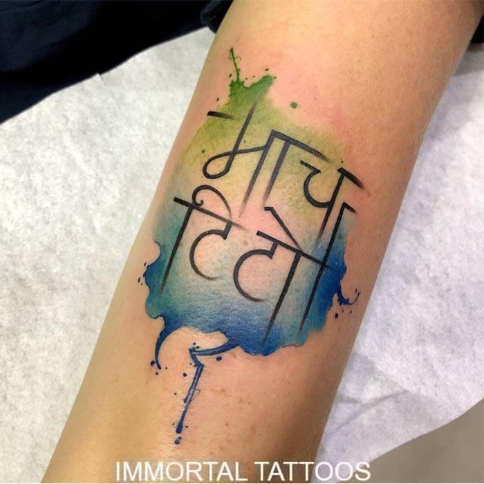 Om and Trishul tattoo on arm  Ace Tattooz